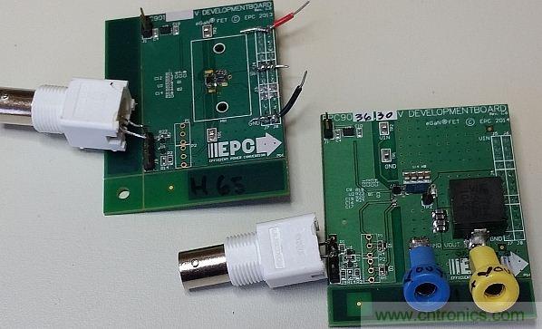 圖1：這里僅在左側(cè)的電路板上配備了半橋配置，右側(cè)的電路板配備了完整的DC-DC轉(zhuǎn)換器。香蕉插座可將測試板連接至電子負載。通過BNC連接器可連接至外部脈沖發(fā)生器。